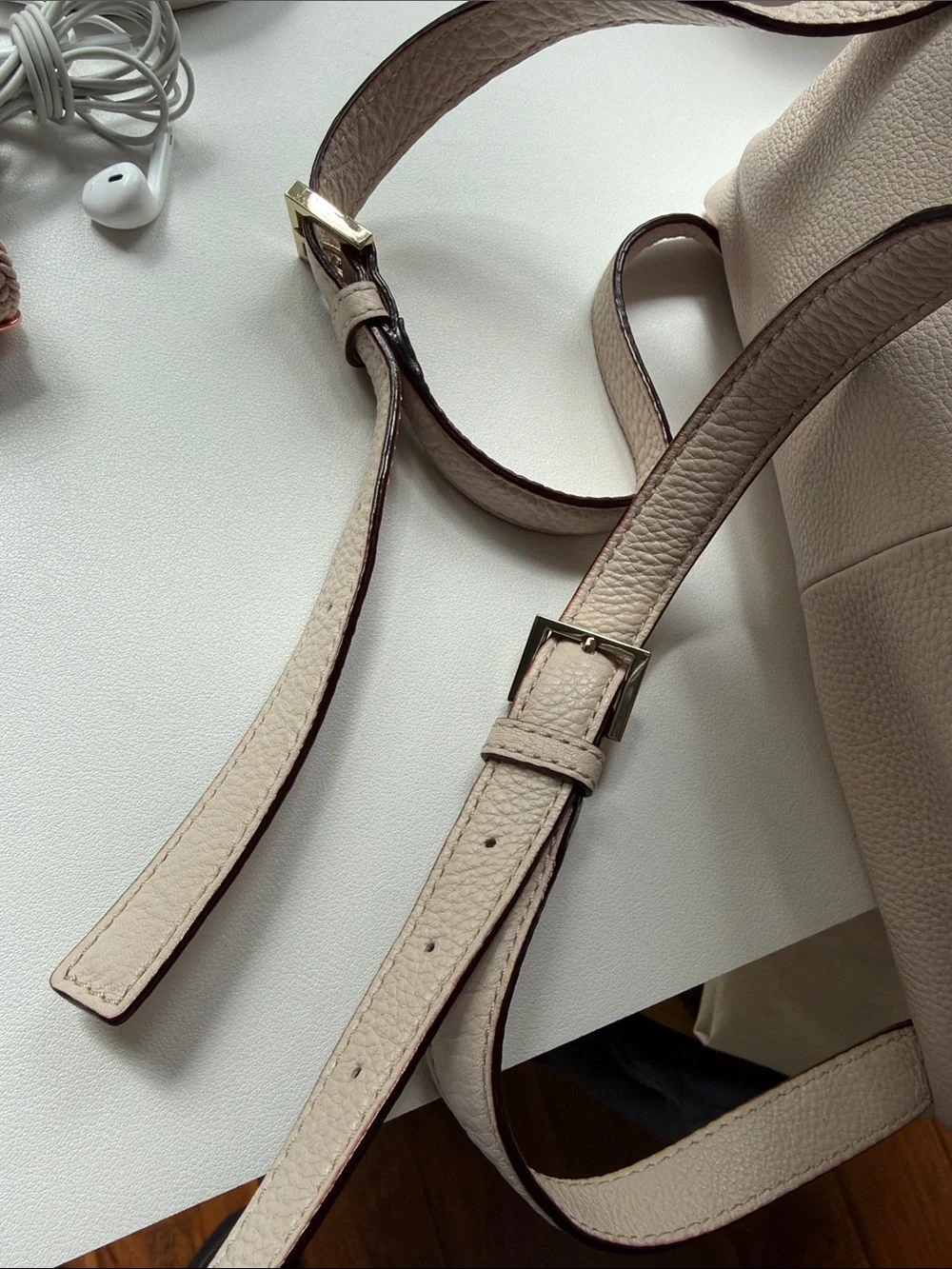 kate spade Pebbled Cream Leather Backpack with Tassel Accents